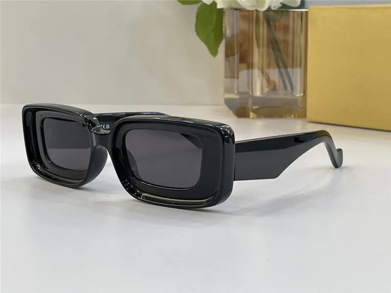 新しいファッションデザイン長方形サングラス 40101 アセテートフレームシンプルで前衛的なスタイルのハイエンド屋外 UV400 保護メガネ