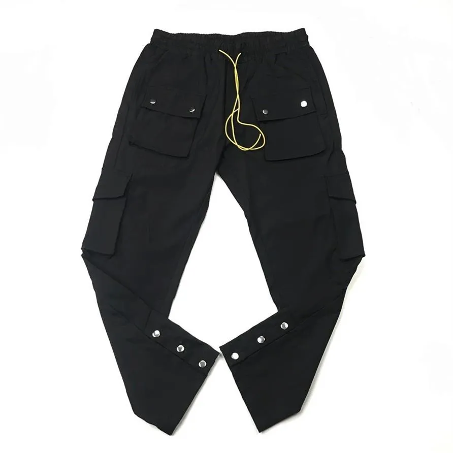 Pantalones cargo de nailon negro con botones a presión Pantalones de chándal Jogger de ajuste holgado Ocho bolsillos Estilo 284M