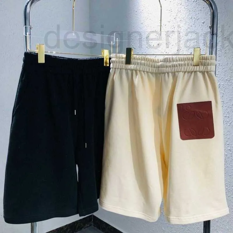 Pantaloncini da uomo Pantaloncini firmati di alta qualità Pantaloni firmati da uomo Pantaloni da donna in pelle con stemma allentato casual di marca marea D31M