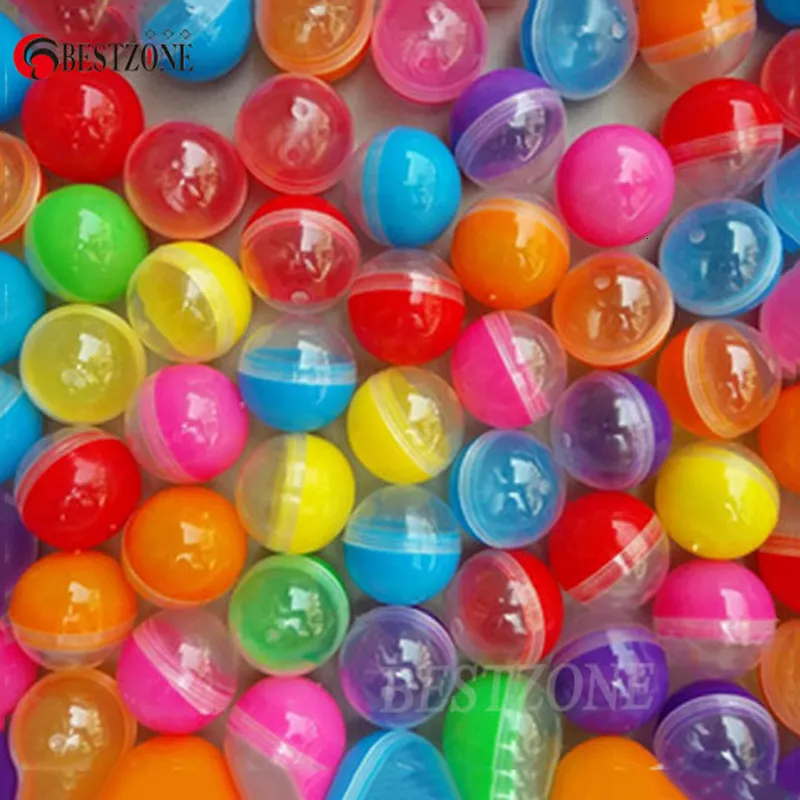 Balloon 100pcs/lot 32mm بلاستيك بلاستيك كبسولات البيع الفارغة نصف صافية نصف اللون مستديرة الكرة المفاجئة 1-1/4 "أطفال للبيع 230706