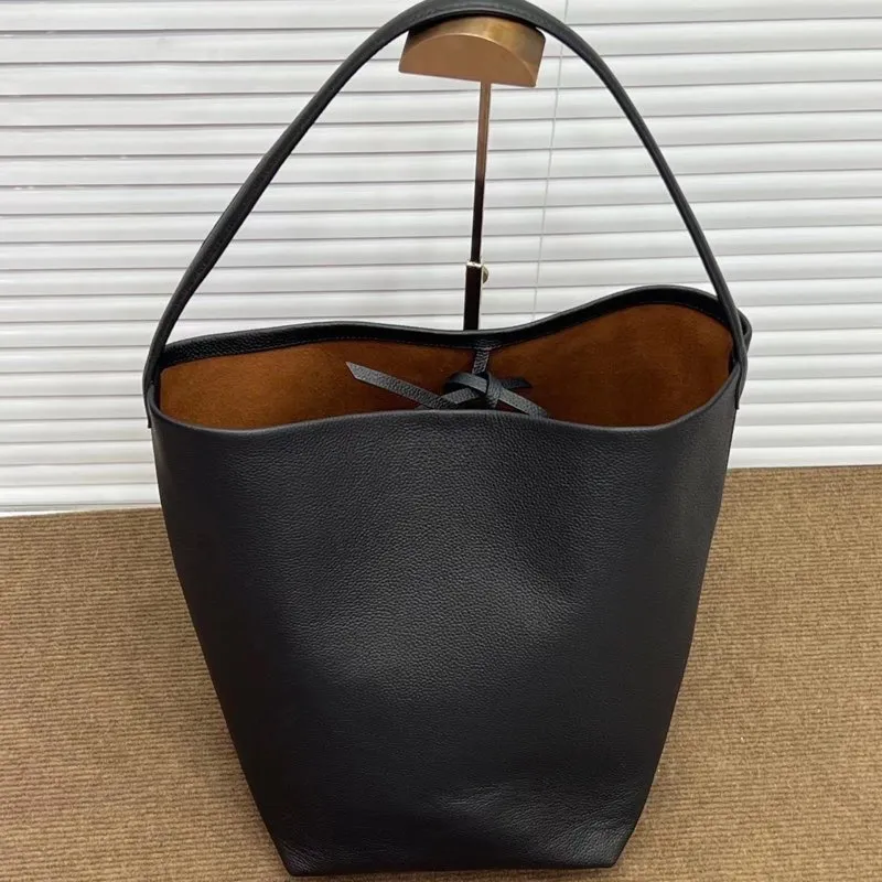 Дизайнерская сумка-ведро Высококачественная нишевая роскошная сумка Сумка на плечо Кошелек Женская кожаная сумка через плечо 230813