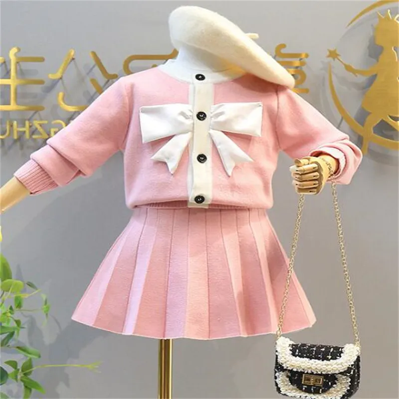 Autunno Inverno Abbigliamento bambini Completi Cappotto maglione con fiocco ragazze + Gonna lavorata a maglia Abito da 2 pezzi Abbigliamento bambini alla moda ragazze