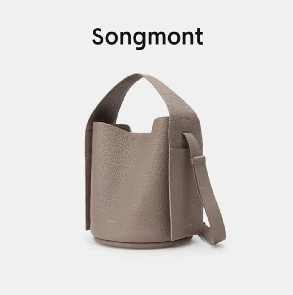 Songmont Ear Series Bucket Feminina Crossbody One Shoulder Trendy New Top Layer Couro Grande Capacidade Mochila Commuter Niche High Sense