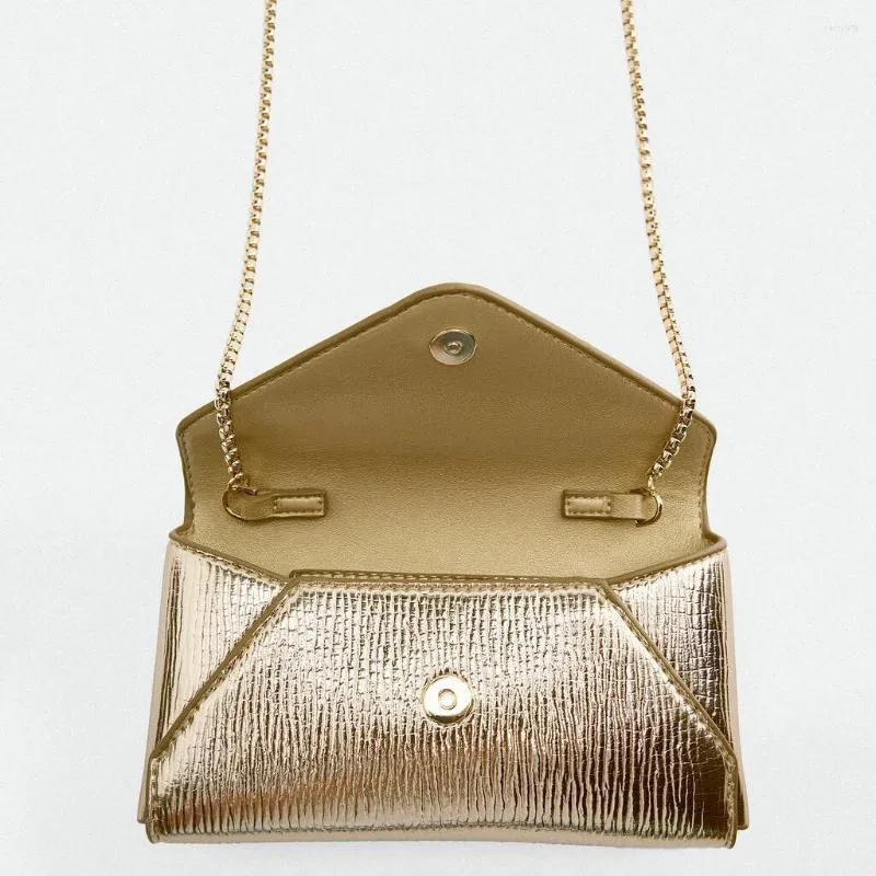 Dull gold clutch bag sale