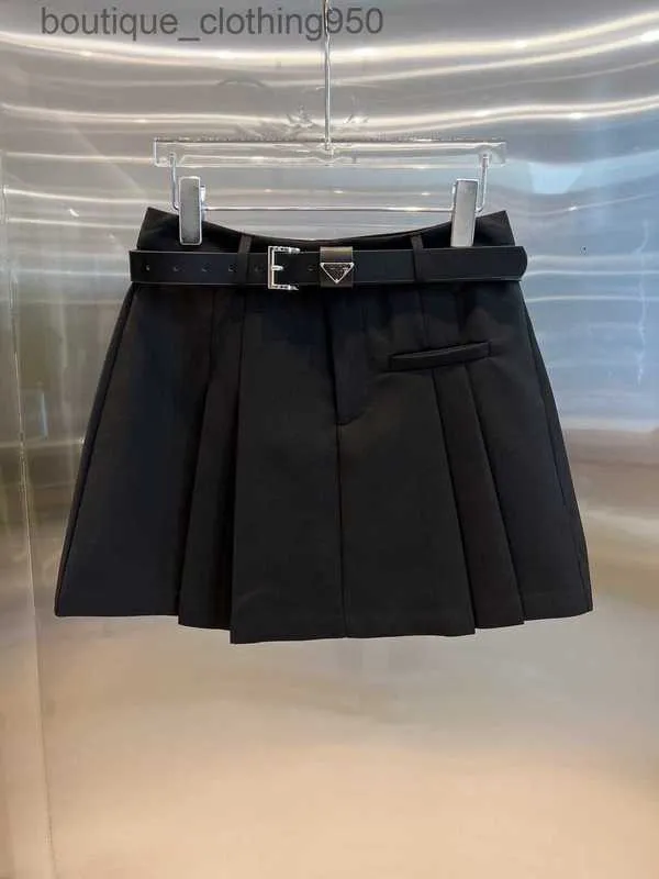 الصيف مصمم تظاهر نسائية P High Weist a triangle metal belt metal leved triangle skirt short slip fit skirt