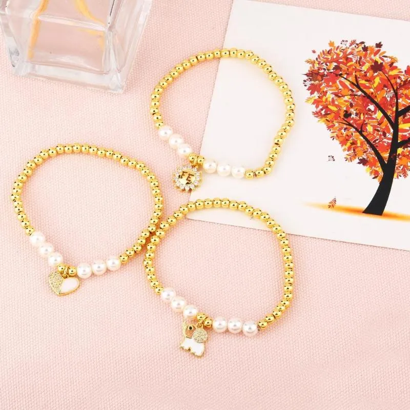 Cadeau pour femme - Bracelet doré - Double perles - Bracelet de perles pour  femmes et filles, Acier inoxydable : : Mode