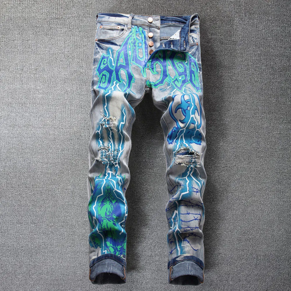 Jeans da uomo in stile europeo Pantaloni da uomo slim in denim di marca Pantaloni dritti blu con foro autunnale con stampa Graffiti per 230710