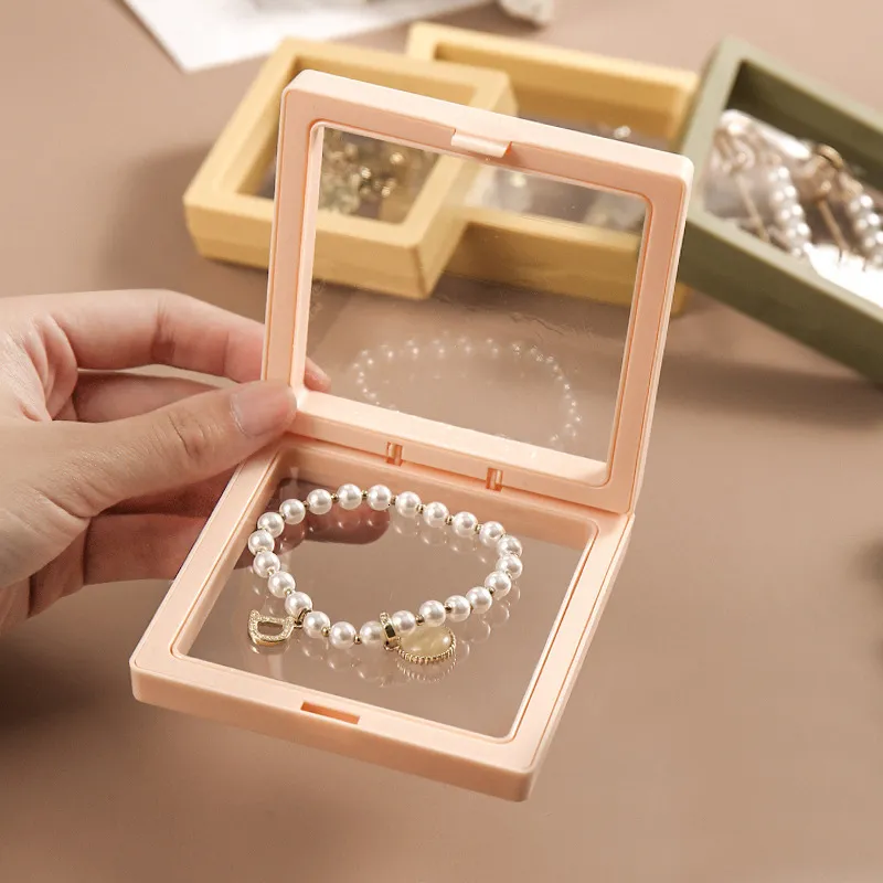 Packaging Boxes 10pcslot Plastic Jewelry Box Transparent Stands 3D Pink Yellow Colorful Picture Frame PE Membrane Floating Display Case Holder 230710
