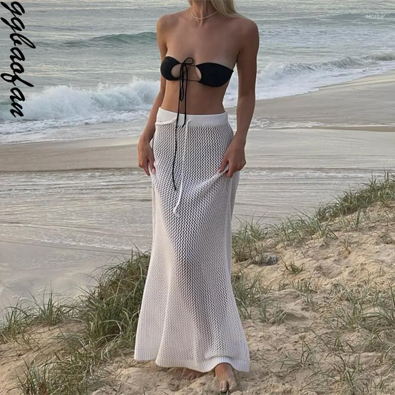 Kjolar Ggbaofan Mode Elegant Hollow Out Stickad Vit Maxi För Kvinnor Kläder Semester Beachwear Kjol Nederdelar genomskinlig