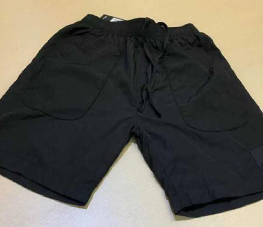 Plage 2023 Shorts d'été Hommes Pantalons courts Mode Running Lâche Processus de lavage à séchage rapide de tissu pur Tendance Casual Hip-hop Ins Stones Tendance loisirs 553ess