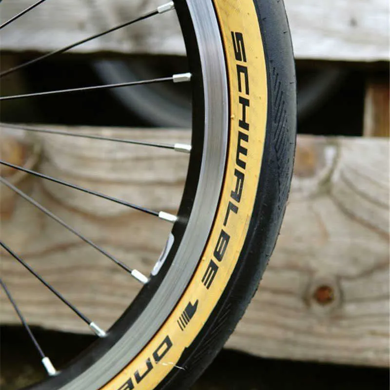 Neumáticos de bicicleta SCHWALBE una bicicleta ultraligera 16x1.35 349 neumático plegable para bicicleta 35-349 borde amarillo anti pinchazo para brompton HKD230712