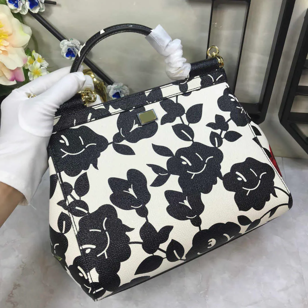 DOLCE & GABBANA ホルカトット刺繍ハイウエストフリフ Dolce & Gabbana フラワー ロンゲットドットスカート ホワイト