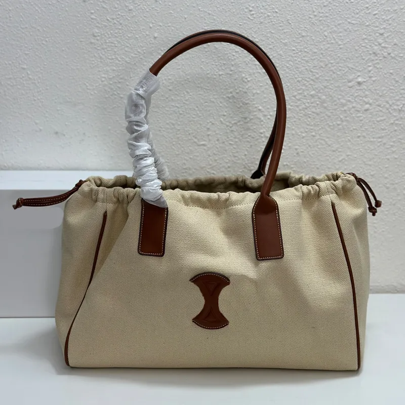 Vrouwen Canvas Lederen Handtas Grote Capaciteit Draagtas Onderarm Tas Brief Trekkoord Opening Sluiting Koeienhuid Mode Reizen Boodschappentassen Interne Rits