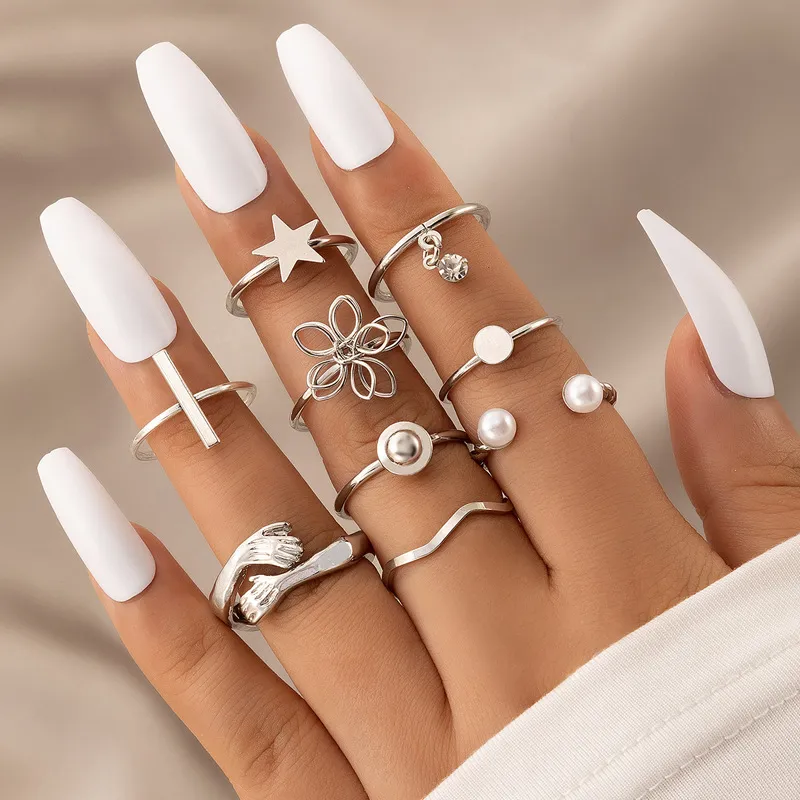 Nowy vintage Hug Flower Wave Knuckle Purning Punk Fashion Star Cross Pearl Zircon Knuckle Finger Pierścień dla kobiet biżuterię imprezową