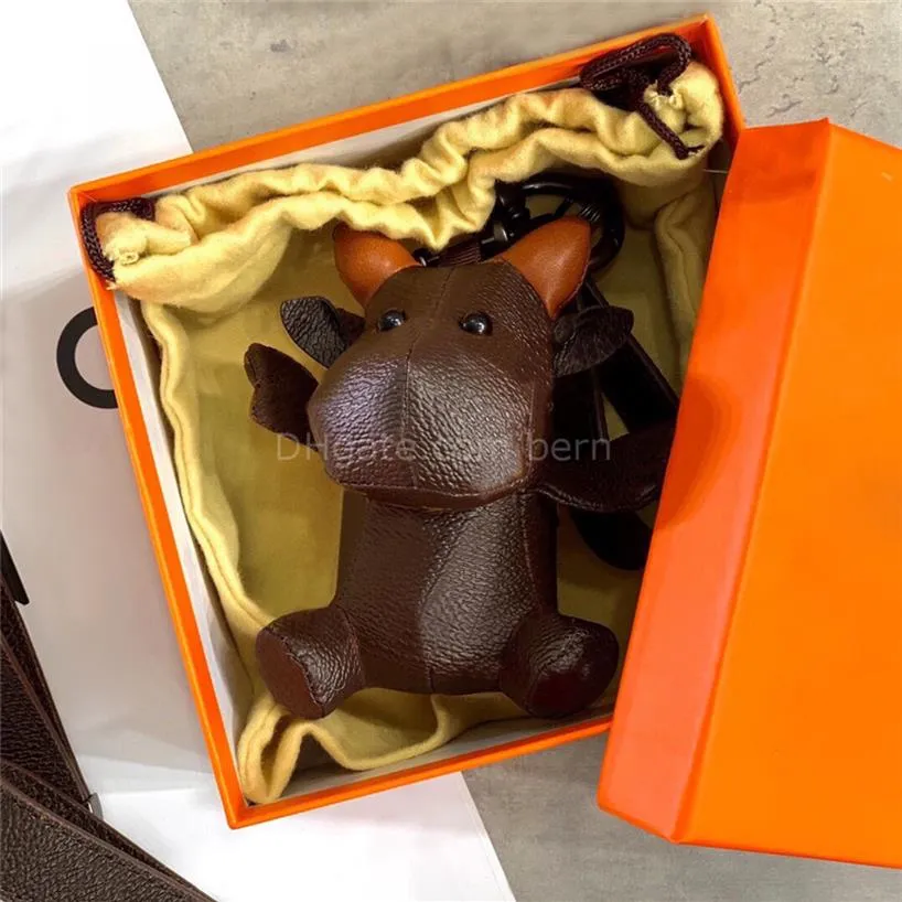 Designer 3D Ox Creative Key Chain Rings Pu Leather Cow Letter Mönster bilknapp med presentbox290p