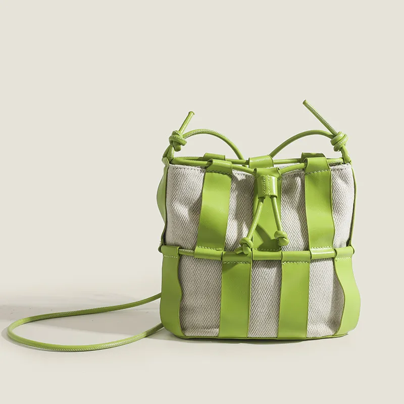 Sac à bandoulière de styliste pour femmes, sac à bandoulière populaire à carreaux, sac cylindrique à chaîne polyvalent, sac de niche couleur bonbon