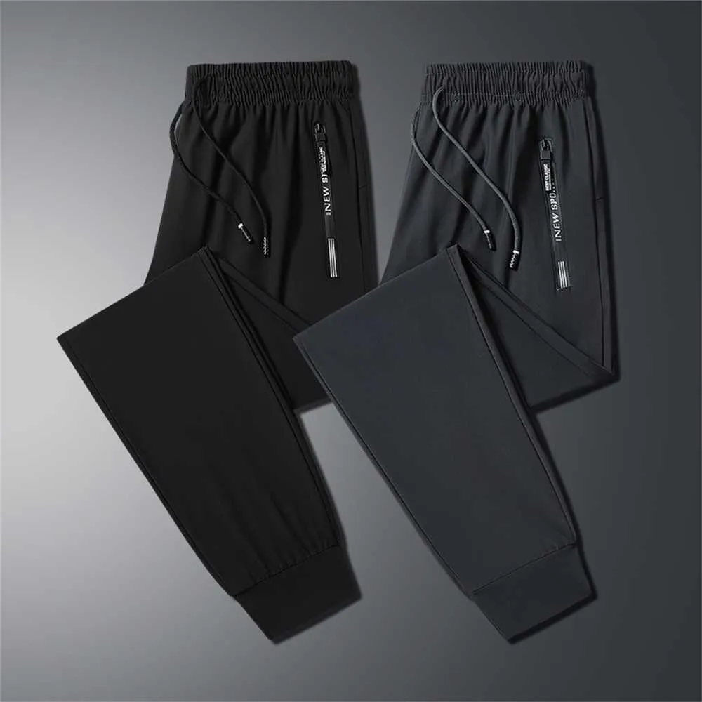 Pantalon en soie de glace pour hommes été mince séchage rapide sport décontracté maille lâche 9/4 petits pieds Trendszp5szp59a27