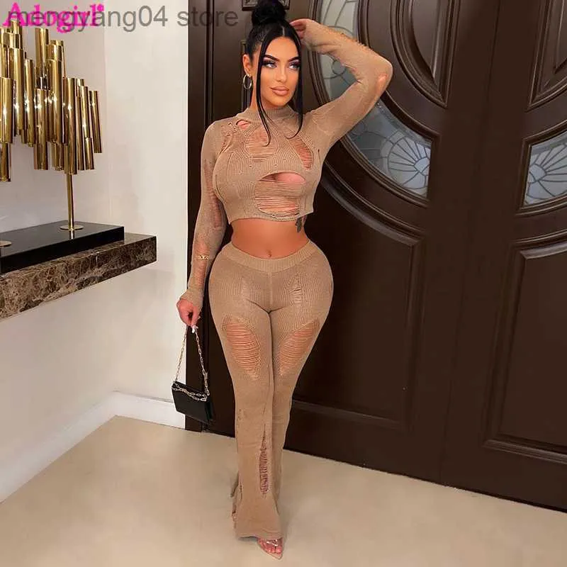 Kvinnors tvåbitar byxor Adogirl Holes Hollow Out Sticked Two Piece Set Women Sexig Se genom långärmad Crop Top Elastic Flare Pants Clubwear Suits T230714