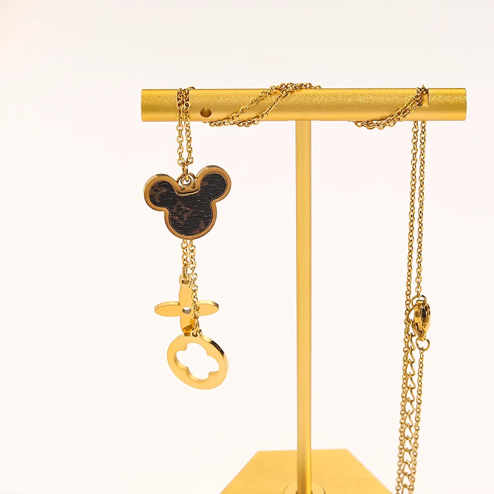 Najnowszy nigdy nie zanikający 18 -karatowy złoto projektant marki wisiorki Naszyjniki kryształowy stal ze stali nierdzewnej list Choker Naszyjnik Akcesoria biżuterii