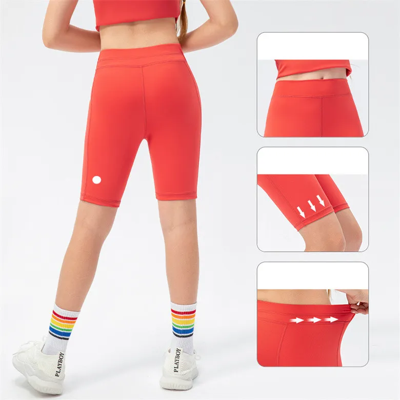 LU Kids Yoga Shorts Outfits High midje Sportkläder Fodrade fitness slitage korta byxor flickor som kör elastisk LL23403