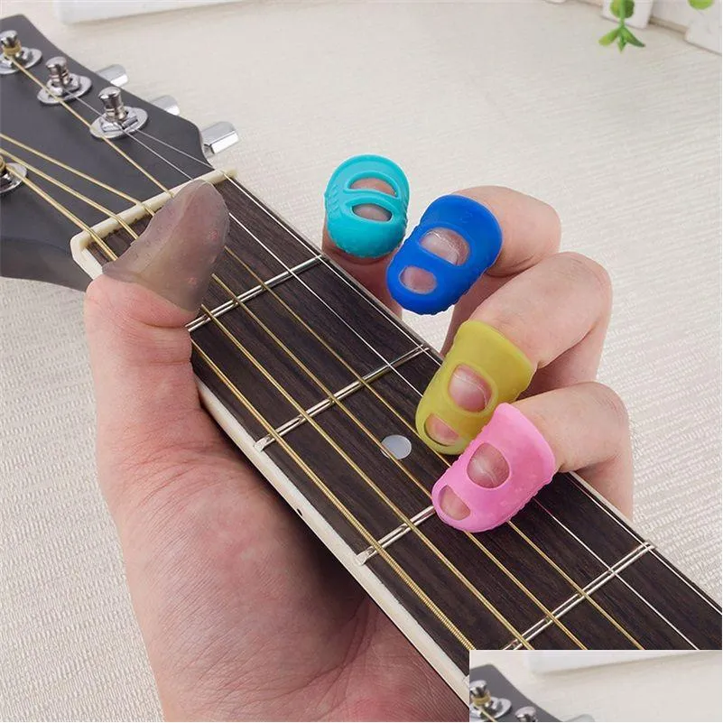 Outros artigos diversos domésticos Sile Guitarra Finger Sleeve Thumb Picks Protectors Usef Para acústico Iniciante String 131 Drop Delivery Home Ga Dhhld