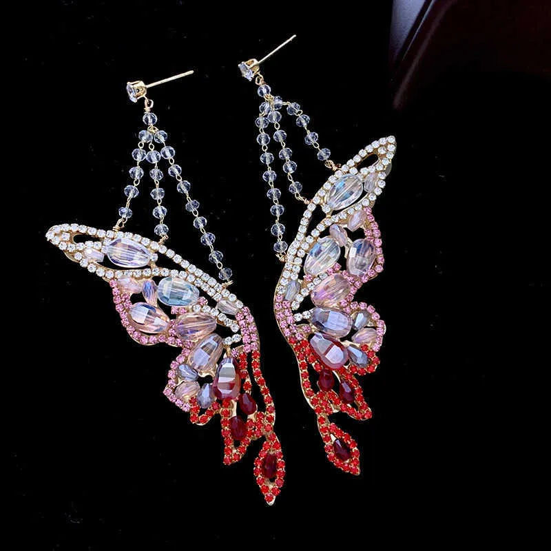 Charm Exaggerate Personnalité Boucles d'oreilles papillon colorées Femme Cristal Zircon incrusté de tempérament élégant Korean East Gate 230630