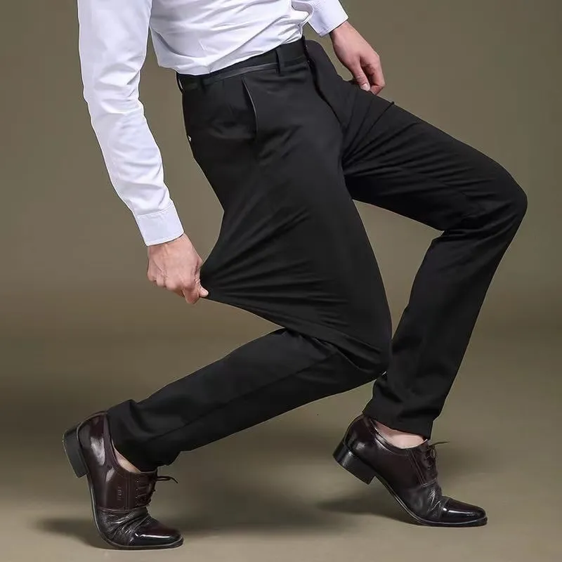 Spodnie męskie wiosna jesień moda na swobodny kombinezon męski elastyczne proste spodnie formalne plus duży rozmiar 28 40 230715