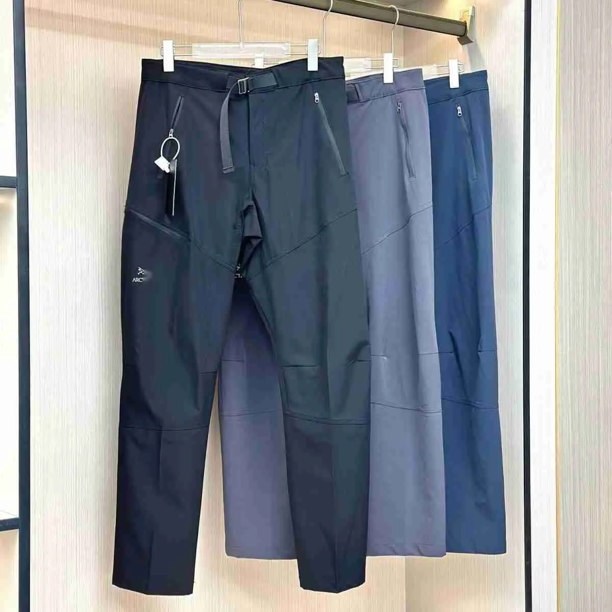 Sport all'aria aperta Pantaloni dritti uomo donna pantaloni sportivi arco pantaloni firmati Pantaloni cargo in plastica a 3 strati pantaloni sportivi impermeabili in nylon