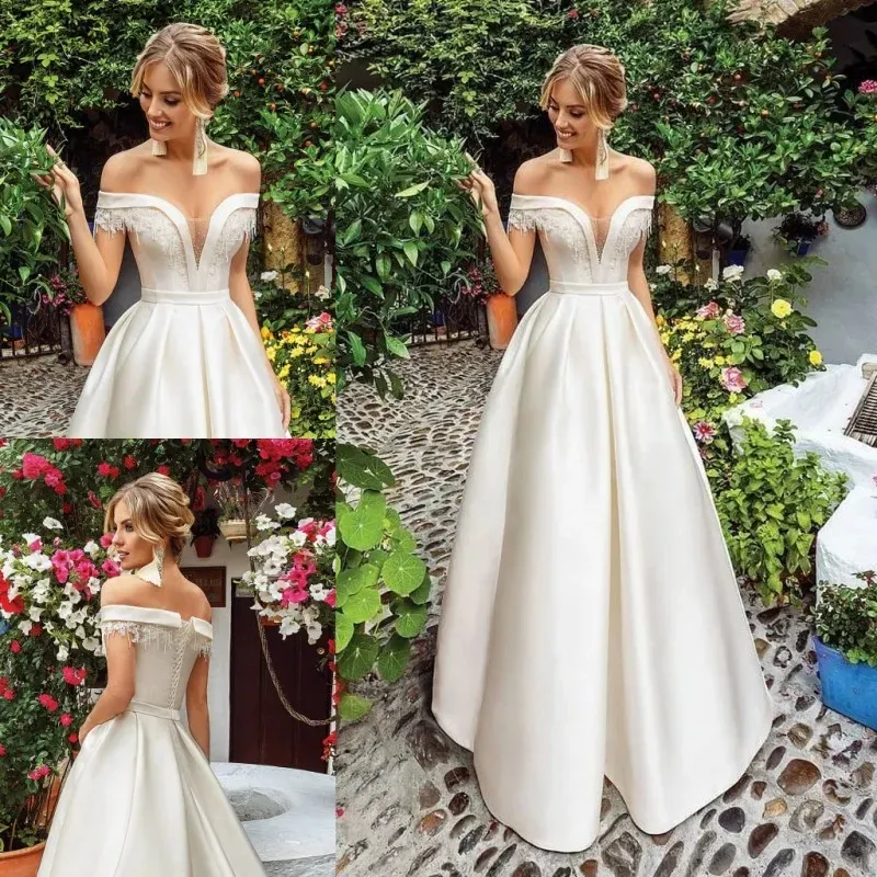 Fabulous Beaded Off Shoulder Wedding Dresses A Line Sheer Plunging Neck Appliqued Bridal Gowns Satin Sweep Train