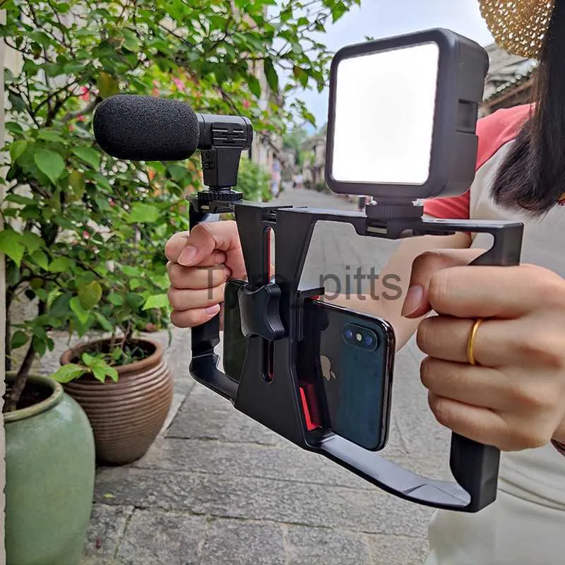 الميكروفونات جديدة! LED Microphone Smartphone Video Rig Kit Handheld Mobile Bettlizers يربط إطار حامل الهاتف لأفلام iPhone أخذ x0717