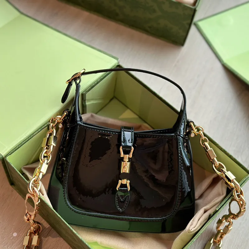 5A Kalite Zinciri El Çantası Lady Omuz Çantası Subaksiller Çantalar Crossbody Canse İnek Orijinal Deri Patent Serpantin Moda Jackie Gold Metal toka debriyaj 699651