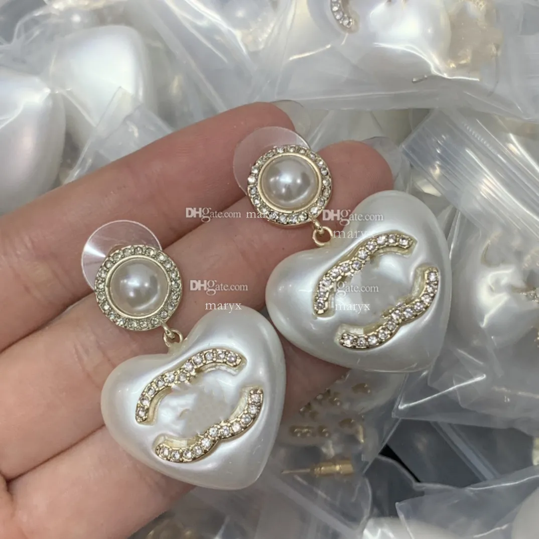 Buy CaratLane Snowdrop Pearl 14k Rose Gold and Diamond Drop Earrings at  Amazon.in
