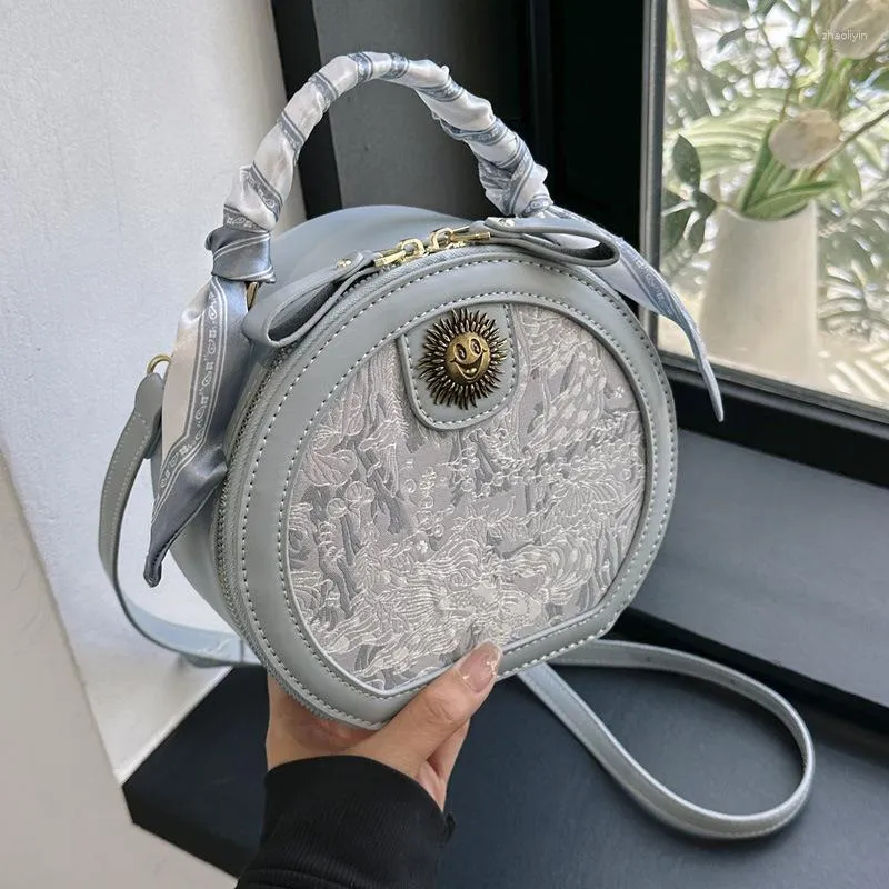 Kvällspåsar lyxdesigner metall liten sol halsdukar pu läder blommig tryck kvinnors handväska mode crossbody väska liten rund tote