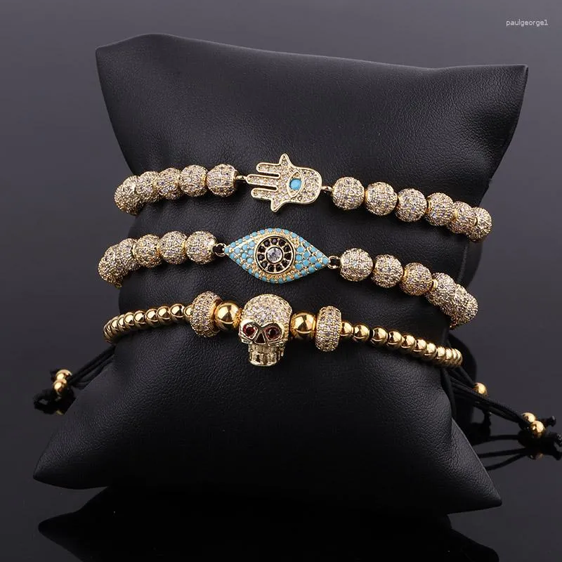 Strand Design Luxury Men Jewelry Chapado en oro CZ Pave SkullHandEye Charm Beaded Pulsera ajustable Set Male