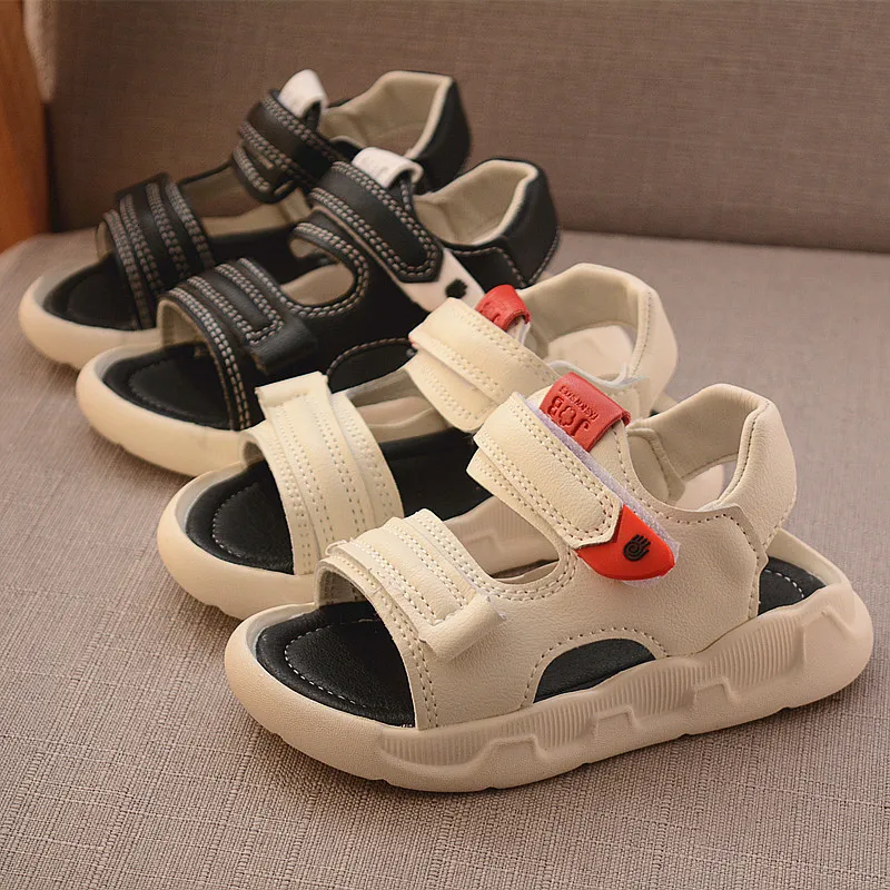 Sandaler Summer Toddler Sandaler Baby Girl Shoes Solid Color Läder Andningsbara pojkar Sneakers Barn Spädbarn Sport pojkar Black Sandals 230718