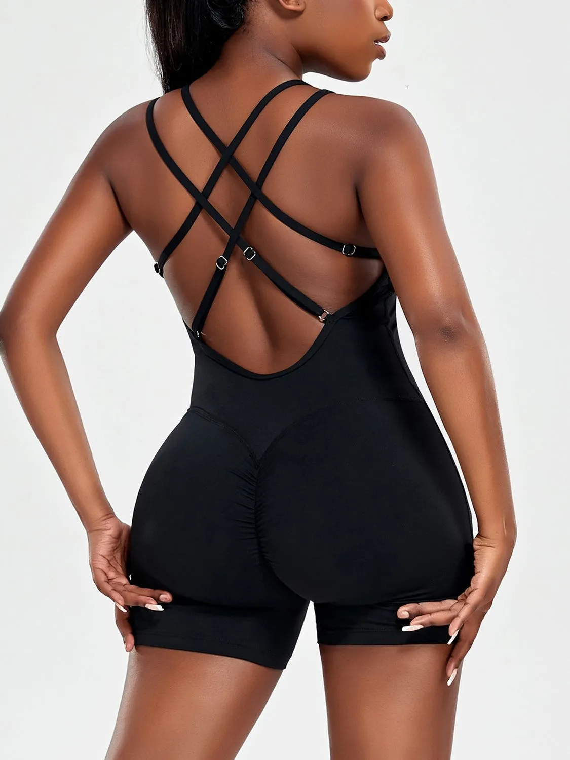 Kvinnors jumpsuits rompers Sexig crisscross backless bodysuit Women's Black Catsuit Yoga Jumpsuit fitnesskläder kvinnlig gym sportkläder kropp playsuit 230717