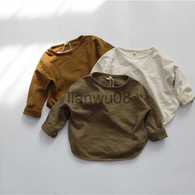 T-Shirts Kinder-Langarm-T-Shirt Frühling Herbst Neue koreanische Jungen- und Mädchen-Baby-Rundhalsausschnitt-feste beiläufige Baumwollbodenbildungs-Hemd WTB03 x0719