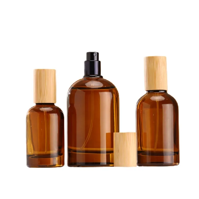 Bouteilles d'atomiseur de parfum Pompe à sertir Couvercle en bois 1 oz 2 oz 3 oz Emballage cosmétique portable Flacons d'échantillon Vide Bouteille rechargeable en verre brun 30 ml 50 ml 100 ml