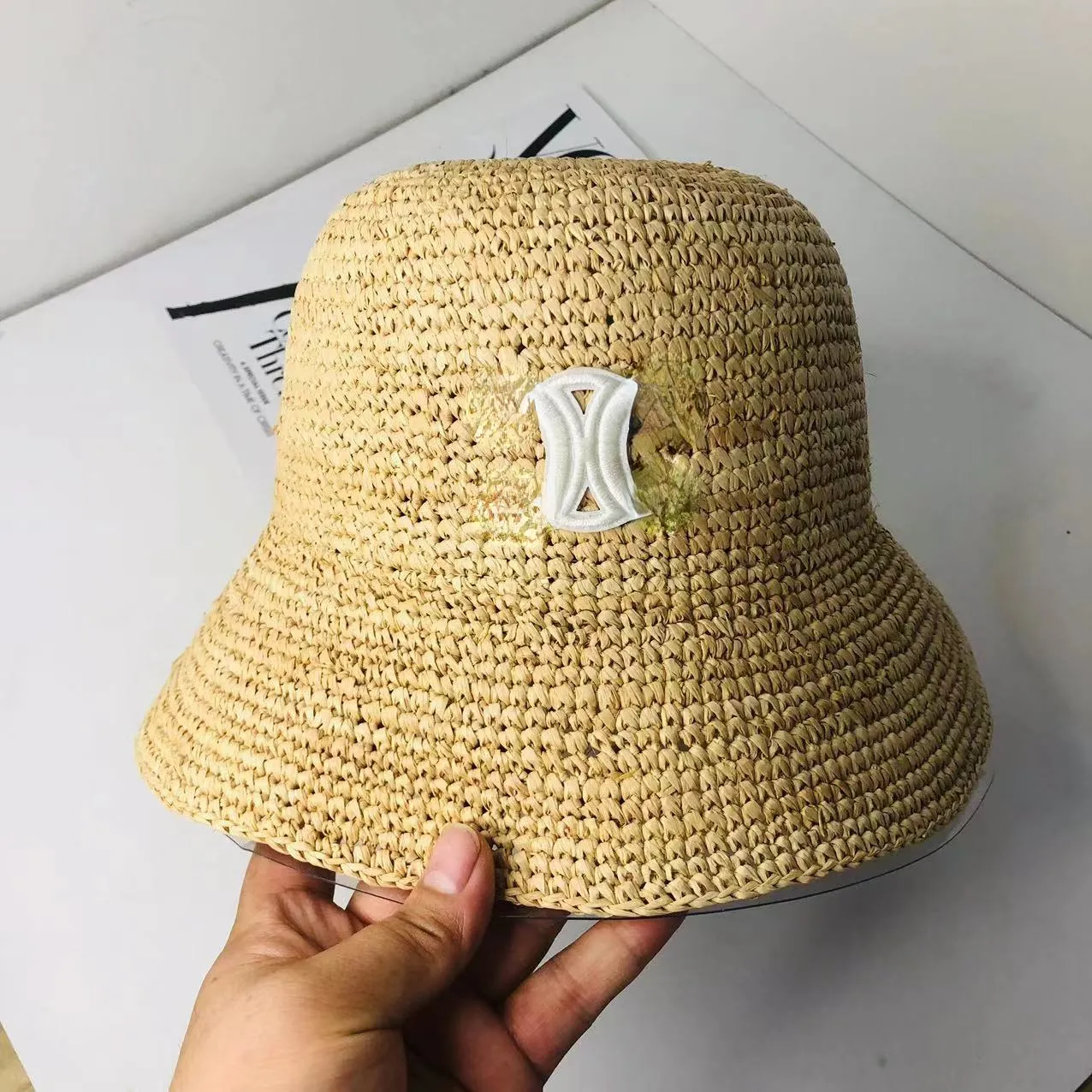 Raffia Straw Bucket Hat with Wide Brim for Sun Protection  display picture 1