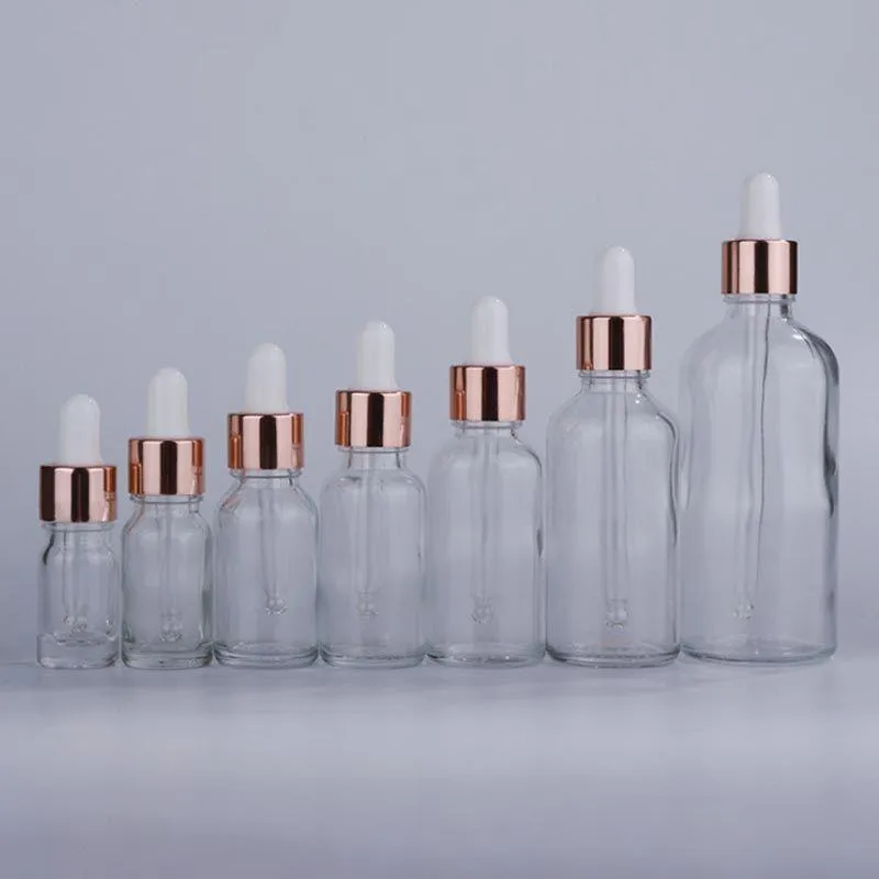 Verre en gros Rechargeable bouteilles de compte-gouttes 5-100 ml Récipient d'huile essentielle vide avec de nouveaux couvercles en or rose kuplm