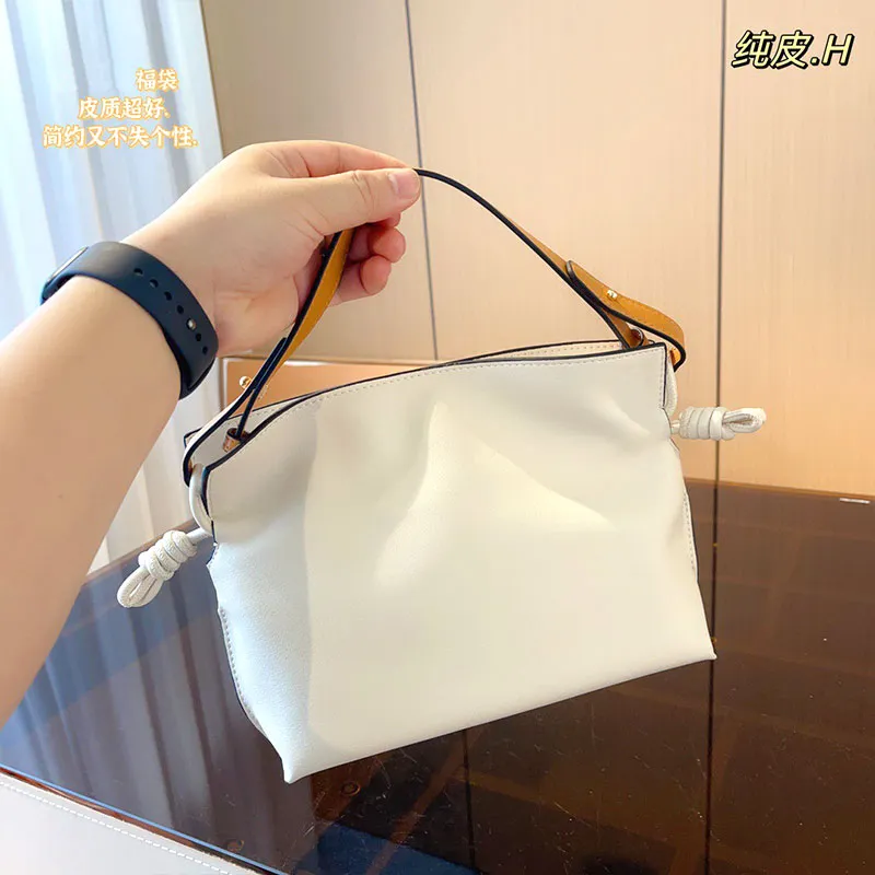 Fashion Designer Pure leather drawstring bag bucket bag side leather makes contoured canvas with leather canvas bag 23x6x18cm Strapless Ball Gown