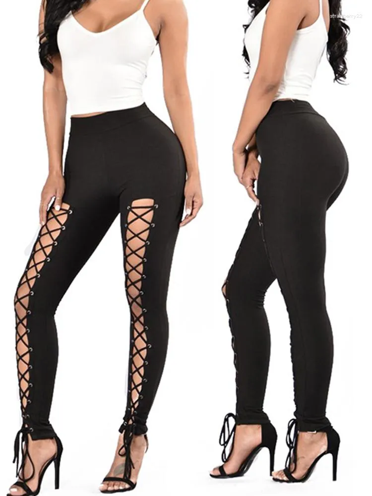 Kvinnors leggings hål ut yogapants Gym Sexig kvinnor Bandage svart elastiskt solid streetwear leggins som kör strumpbyxor