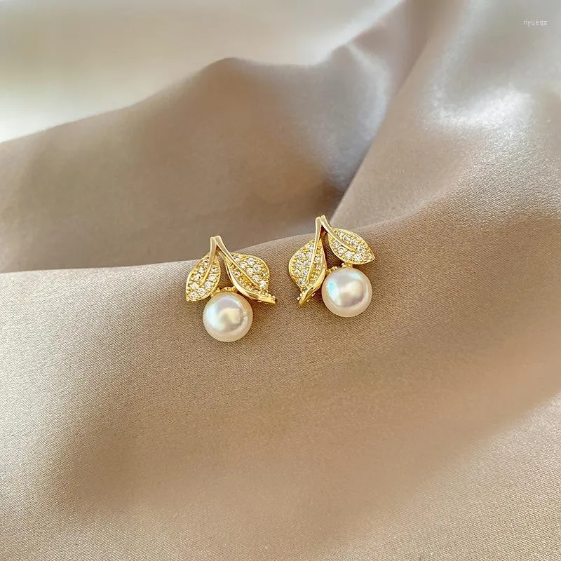 Kolczyki stadnorskie 2023 Koreańskie kontraktowe letnie starsze perłowe kolczyki moda Kryształ Liście Modelowania Trend Biżuteria