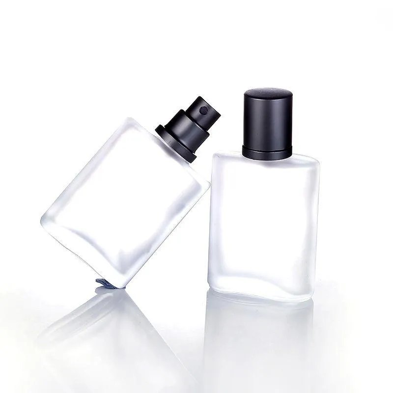 Vente la plus chaude 30ml bouteilles de pulvérisation en verre transparent givré en gros bouteille d'huiles essentielles pour parfum cosmétique en stock Xocnt