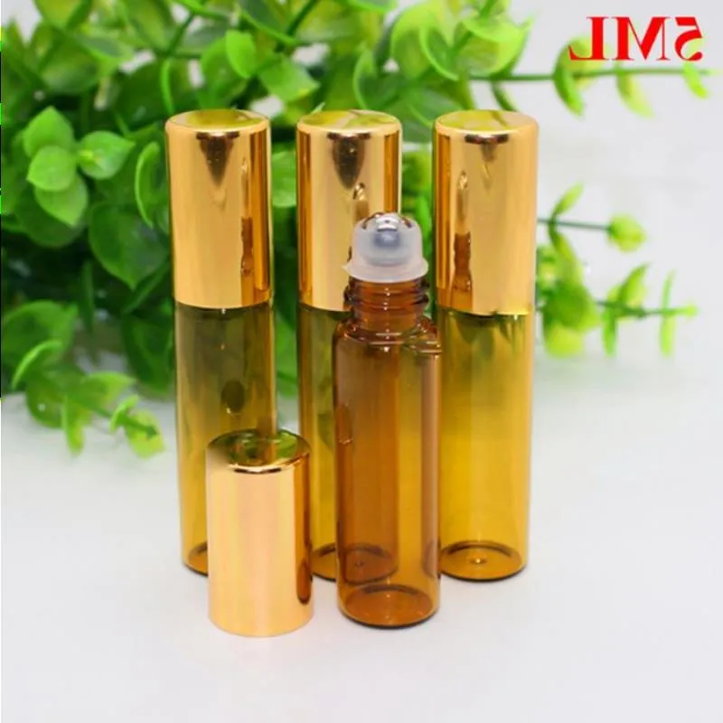 Mini 5ml Kahverengi Amber Cam Rulo Paslanmaz Çelik Silindir Top ve Altın Kapağı Toptansı ile Esansiyel Yağ Parfüm Şişelerinde 1100 PCS/LOT LKCUP