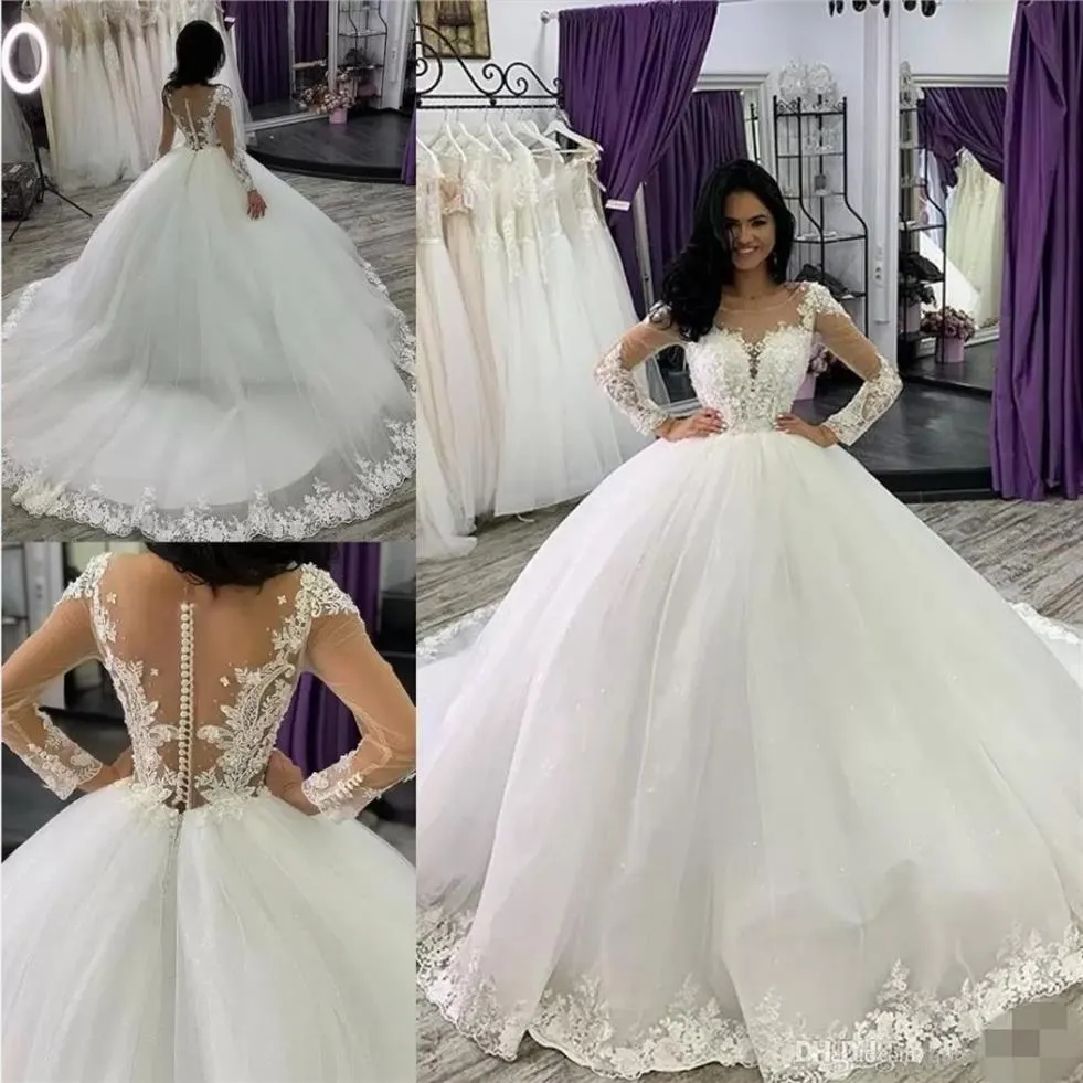 Aso ebi Long Sleeves Ball Gown Dubai Wedding Dresses Sheer Crew Neck Lace Aptiques Beaded Vestios de Novia Bridal Gowns with Butt2466