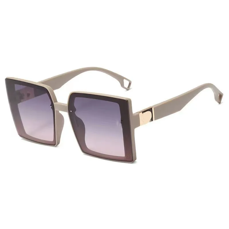 Lunettes de soleil de mode Designer lettre femmes Mens Goggle senior Lunettes pour femmes monture de lunettes Vintage À la mode et beau Lunettes de soleil D lumière polarisée