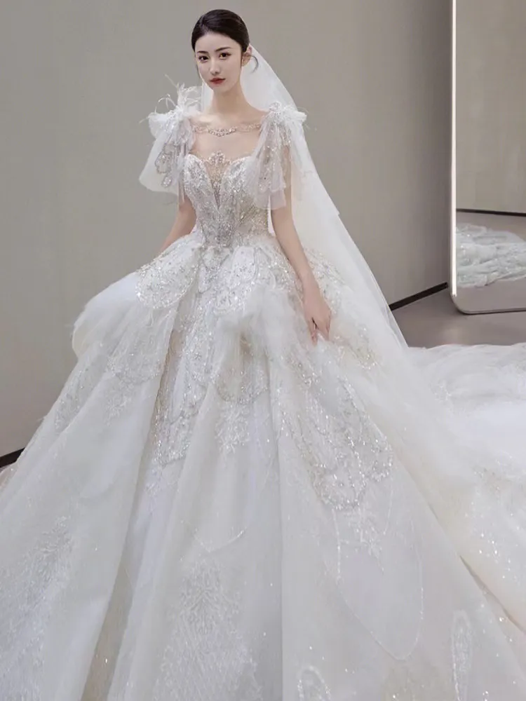 2023 Romantico abito lucido abito da sposa Elegante scollo a barchetta bling Lungo treno Una linea Tulle multistrato Abiti da sposa da sposa Corsetto Indietro Abiti da sposa vestido de novia