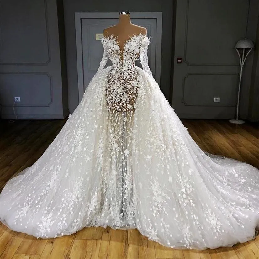 Ilusión de lujo Sobrefaldas Vestidos de novia Mangas completas Sexy Ver a través de perlas Apliques Vestidos de novia Cuello transparente vestido de novia263Q