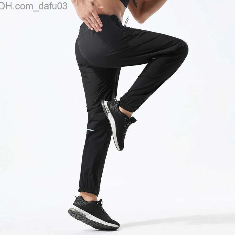 Pantalons pour hommes LUU Designer luxe été hommes pantalons tirer corde taille élastique exercice fitness course en plein air séchage rapide pantalons légers joggers course Z230721